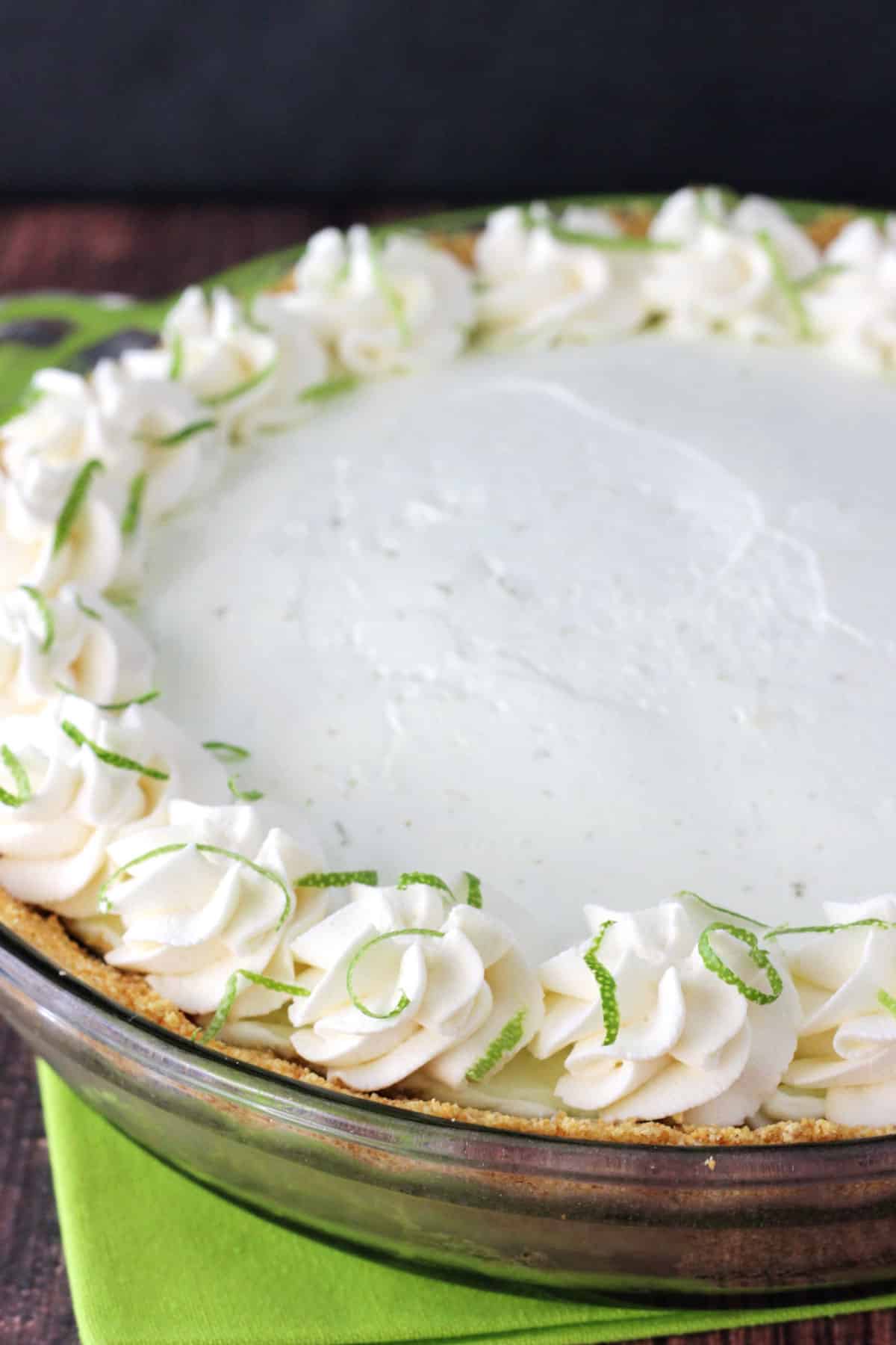 Close up of a no bake margarita pie in a glass pie pan.