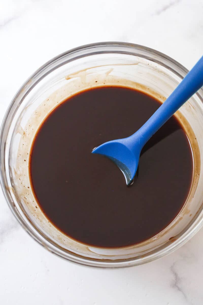 These customizable no-bake rum balls are a holiday must-have, perfect for gifting, gatherings, or adding to your festive cookie tray! A mixture of melted chocolate, rum, and corn syrup.