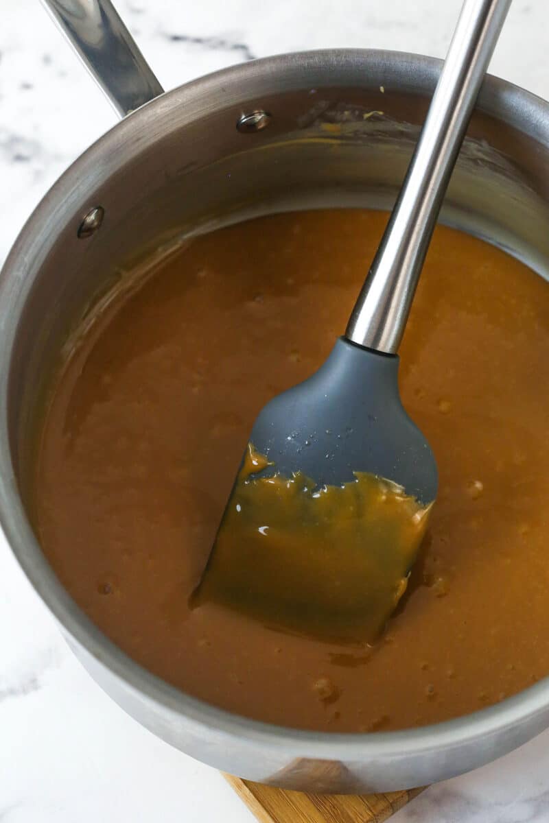 These decadent turtle thumbprint cookies feature a rich chocolate base, gooey caramel center, and crunchy pecan coating. Wow! Caramel sauce in a pot.