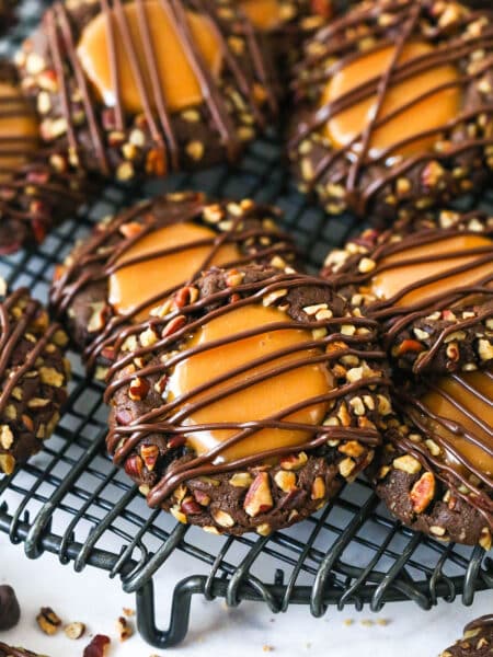 Turtle thumbprint cookie on a cooling rack.