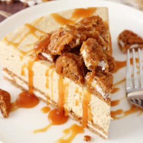 Top view of a slice of no bake oatmeal cream pie cheesecake on a white plate.