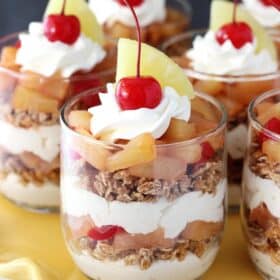 Pineapple Upside Down Trifles on a yellow cake stand.