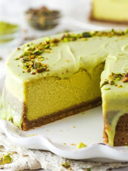 pistachio cheesecake with slice removed