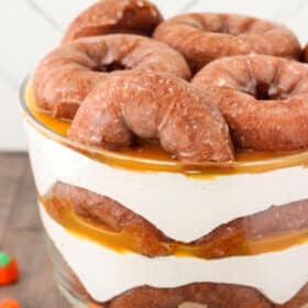 Close up of the side of a pumpkin spice donut cheesecake trifle.