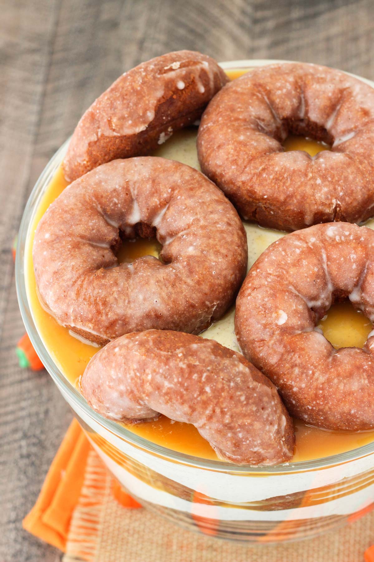 Close up of the top of a pumpkin spice donut cheesecake trifle.