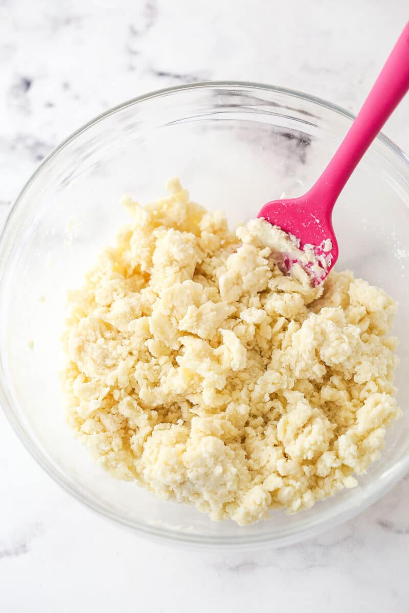 Mixing pie crust ingredients together
