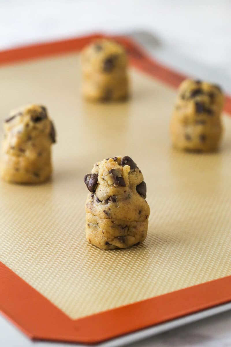 These Brown Butter Chocolate Chip Cookies take classic chocolate chip cookies to a whole new level, with a rich and slightly nutty flavor. Tall balls of brown butter chocolate chip cookie dough