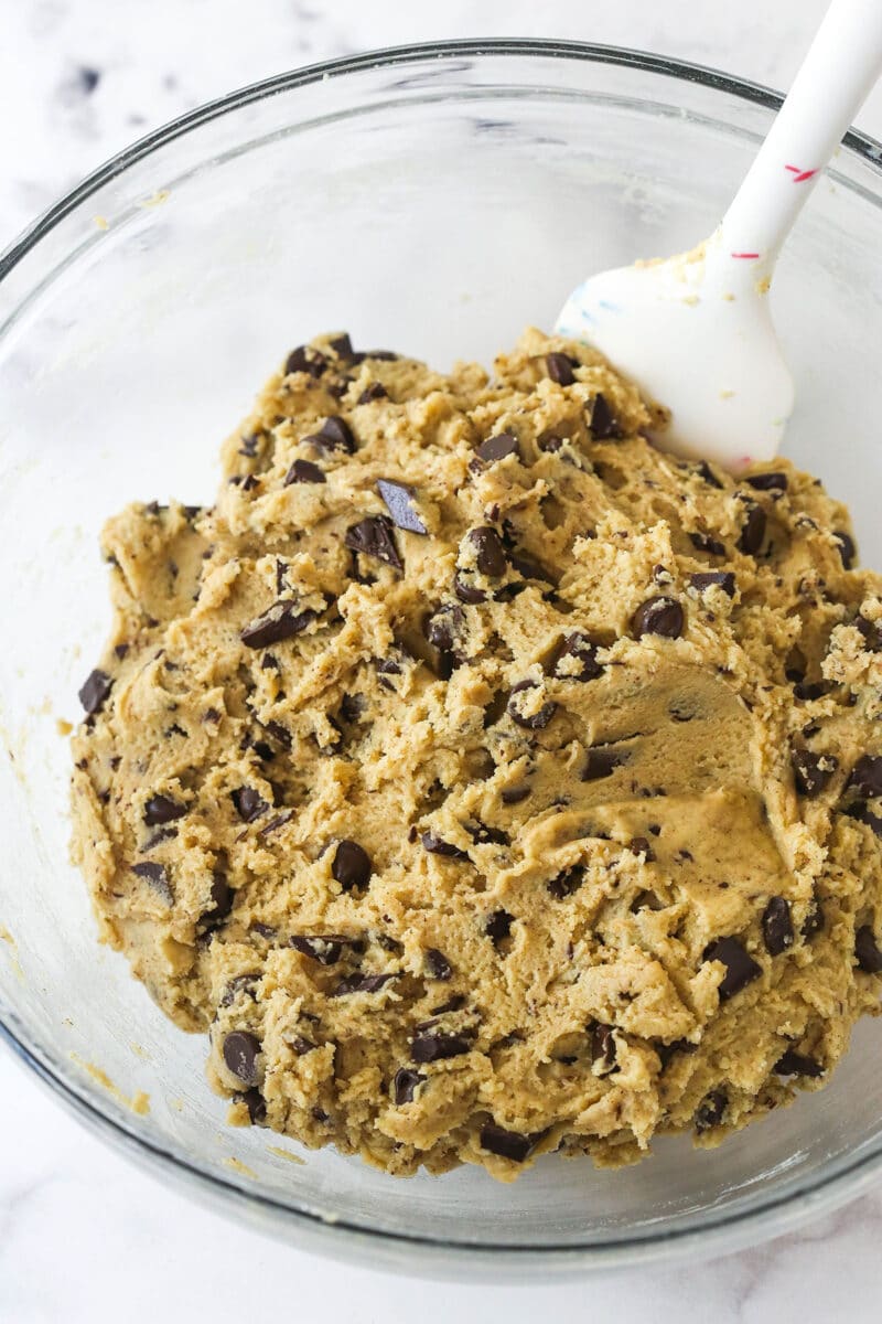 These Brown Butter Chocolate Chip Cookies take classic chocolate chip cookies to a whole new level, with a rich and slightly nutty flavor. Folding chocolate chips into brown butter cookie dough