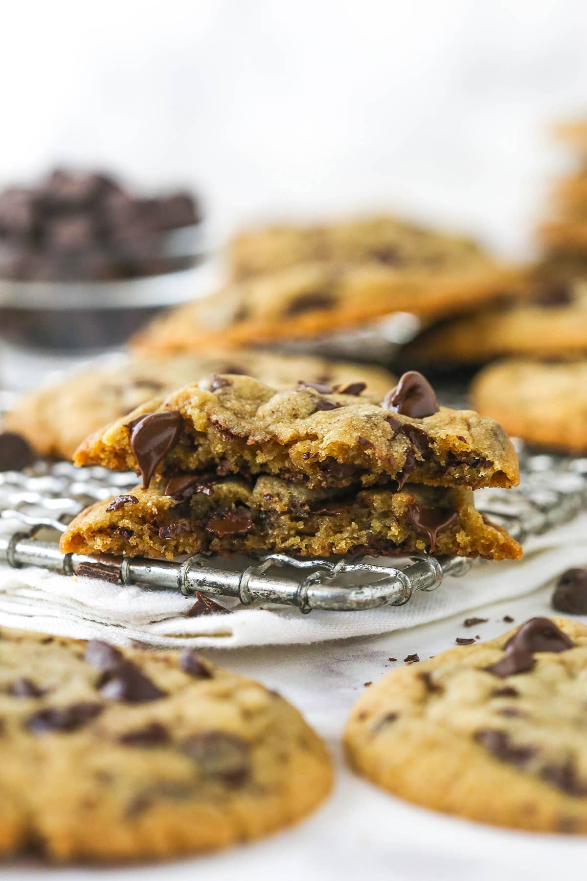 A brown butter chocolate chip cookie in half to show the inside
