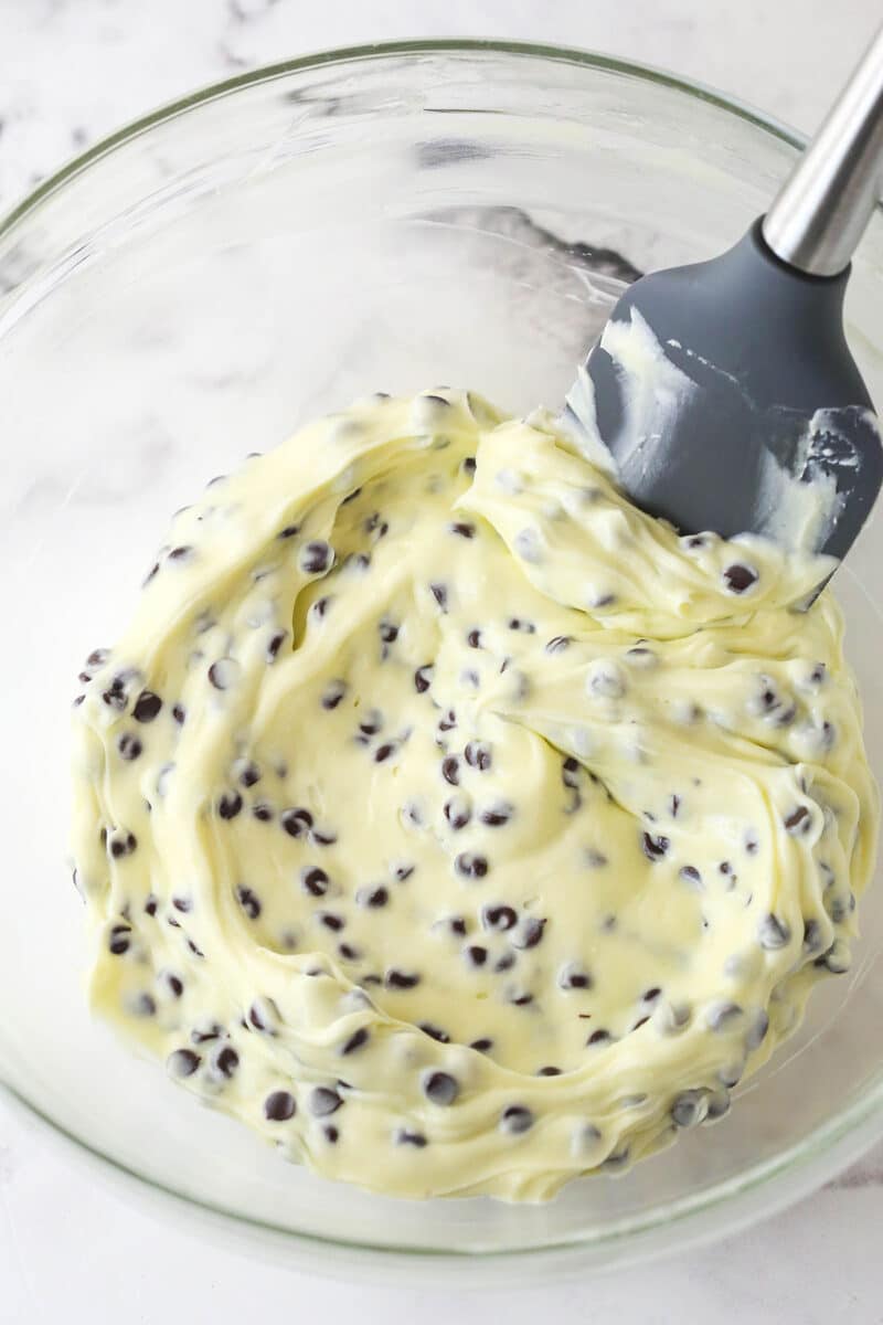 These Black Bottom Cupcakes combine two desserts in one with a rich chocolate cupcake and a creamy chocolate chip cheesecake filling. Folding mini chocolate chips into cream cheese filling