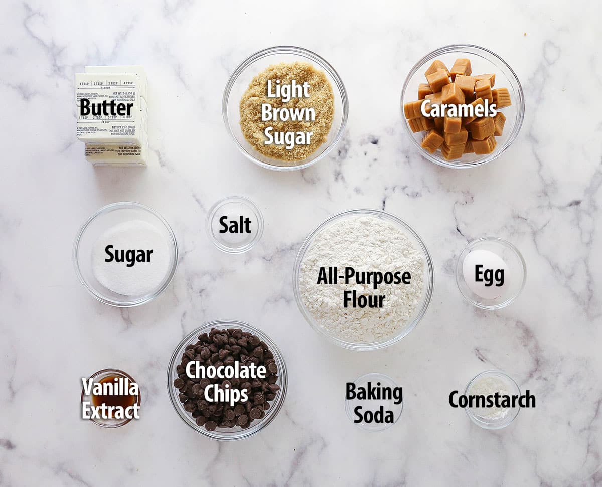 These Caramel Cookie Bars combine gooey caramel and chewy chocolate chip cookies in one perfect dessert. Easy to make! Overhead view of ingredients needed to make caramel cookie bars