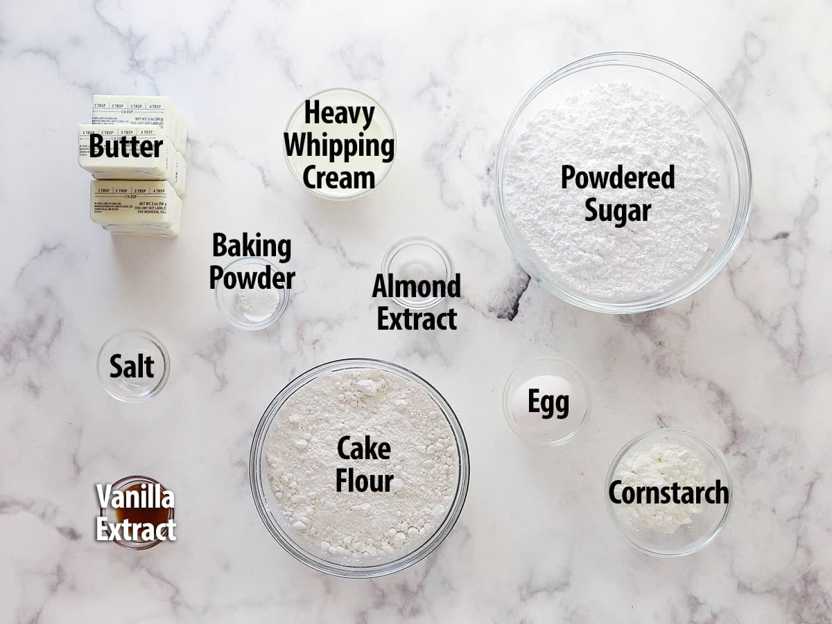 These copycat Lofthouse Cookies are soft and cakey with a melt-in-your-mouth texture and light flavor, just like the ones at the supermarket. Overhead view of ingredients needed to make Lofthouse cookies