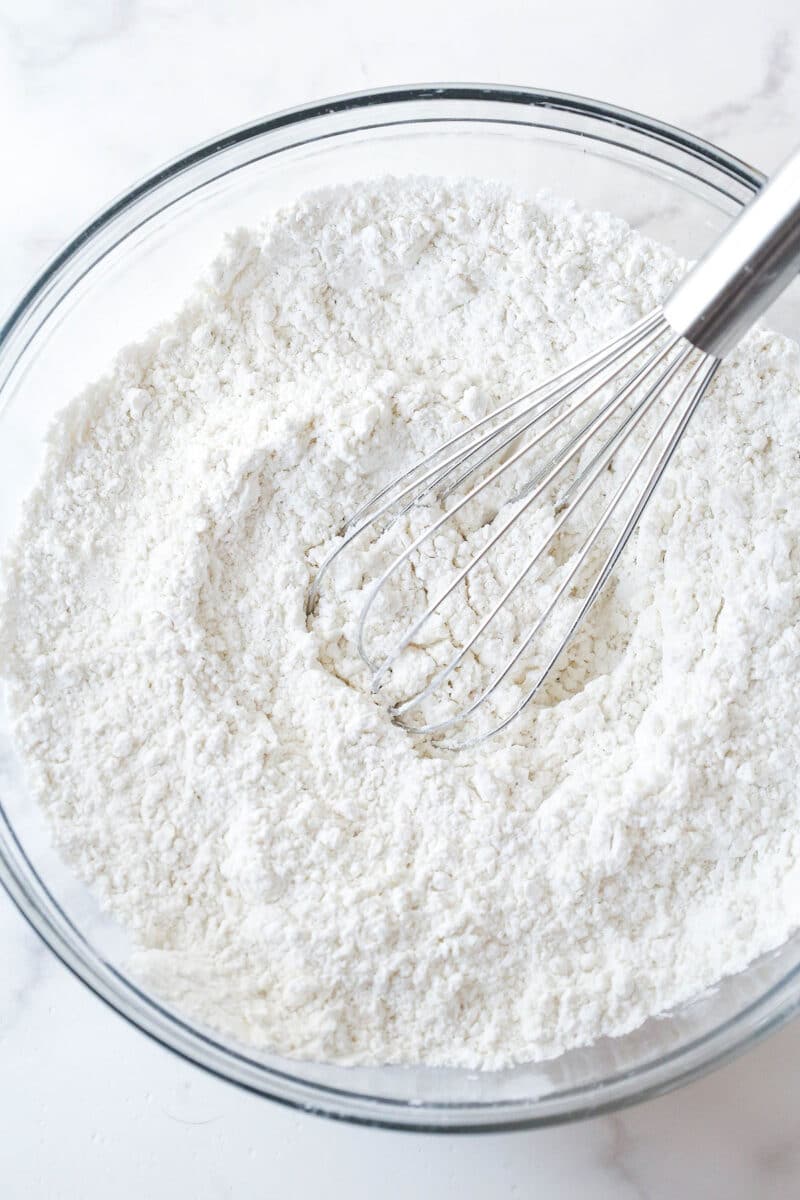 These copycat Lofthouse Cookies are soft and cakey with a melt-in-your-mouth texture and light flavor, just like the ones at the supermarket. Whisking dry cookie ingredients together