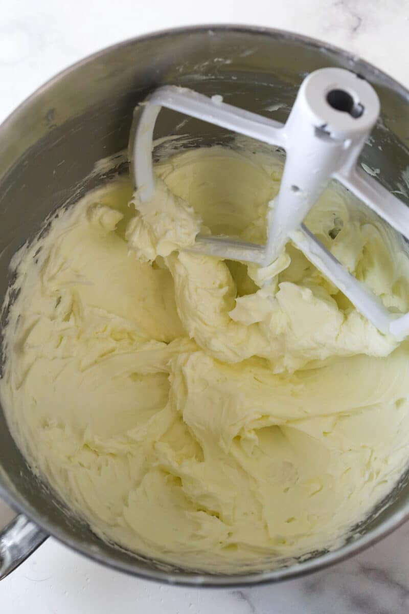 These copycat Lofthouse Cookies are soft and cakey with a melt-in-your-mouth texture and light flavor, just like the ones at the supermarket. Creamed butter and powdered sugar in a mixing bowl