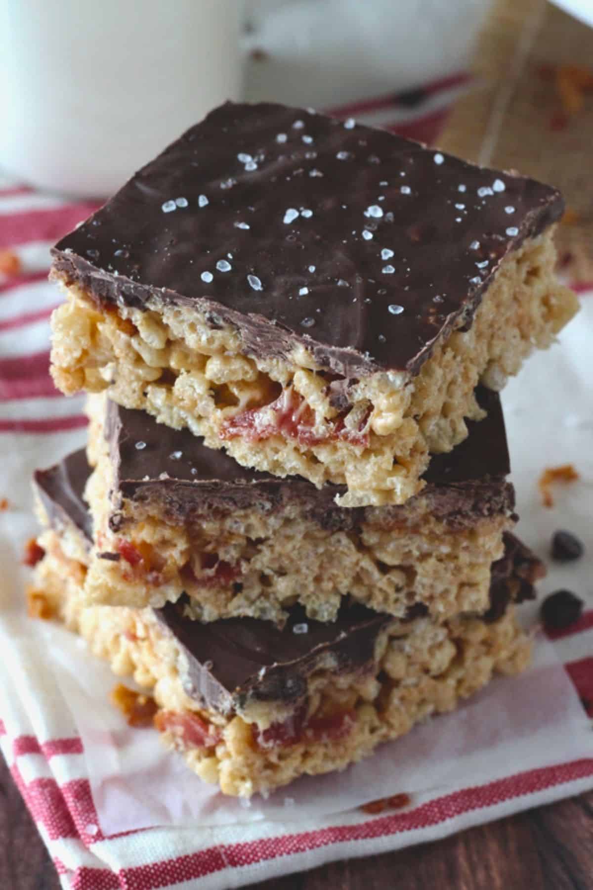 Top view of three maple bacon rice krispie treats stacked one on top of the other.