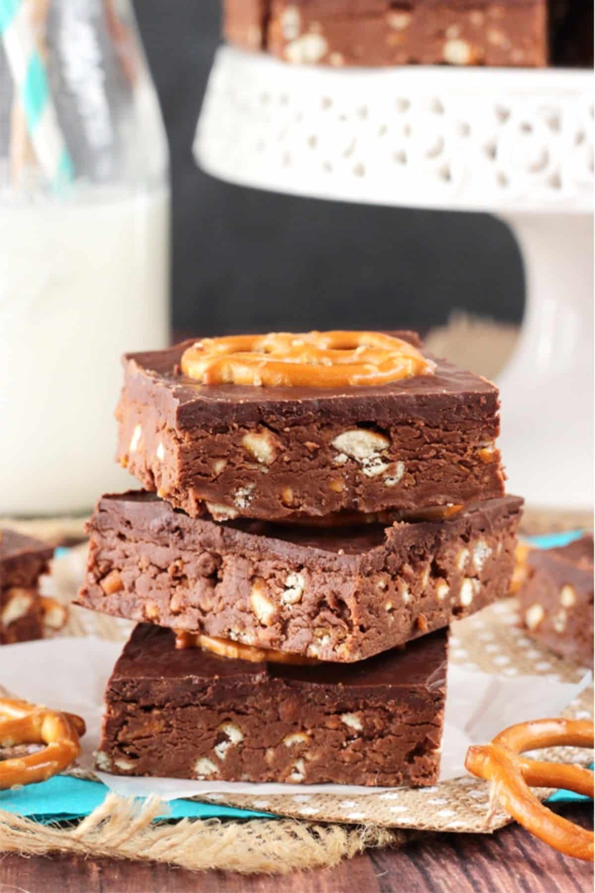 Close up of three no bake Nutella pretzel bars stacked one on top of the other.