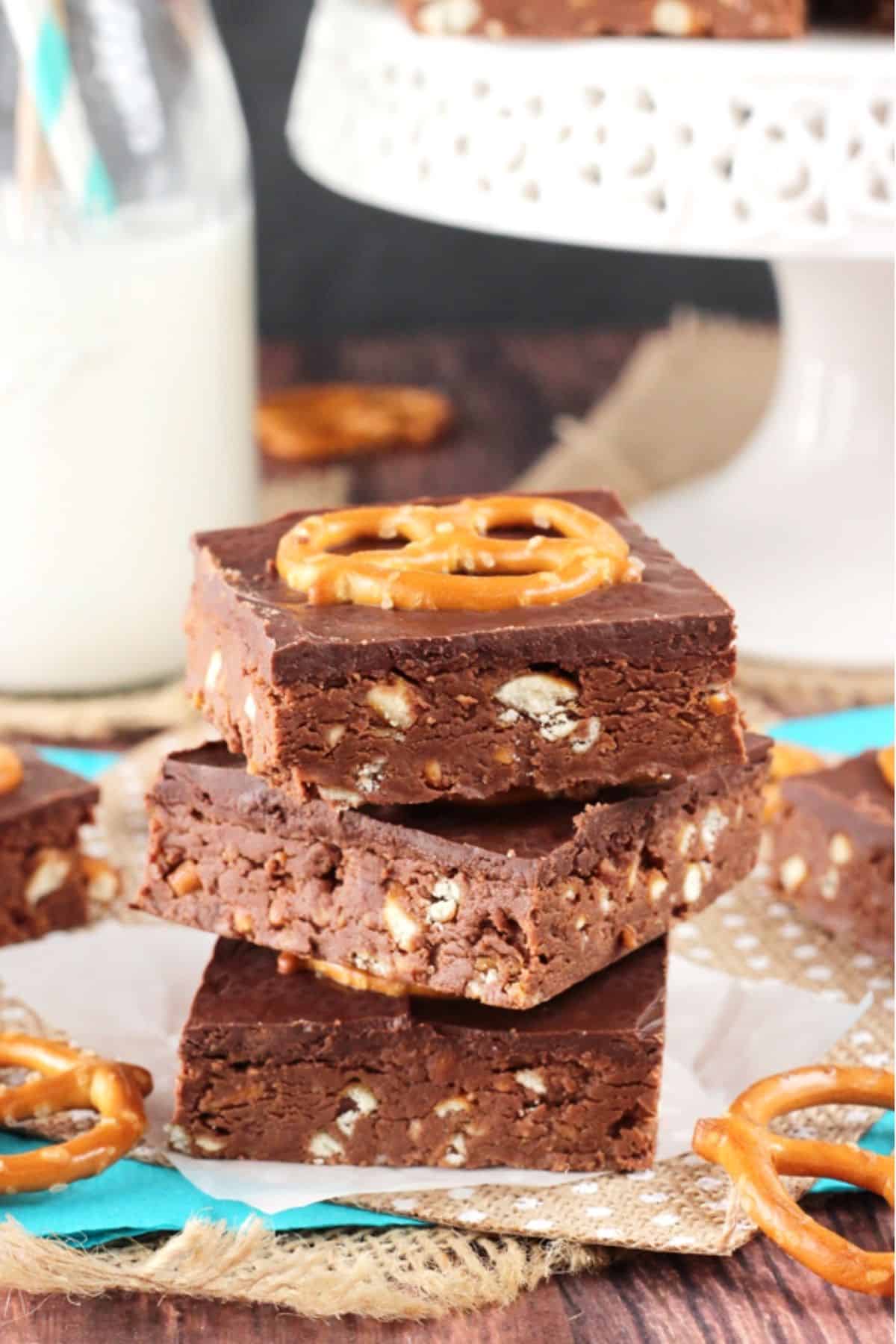 Three no bake Nutella pretzel bars stacked one on top of the other.