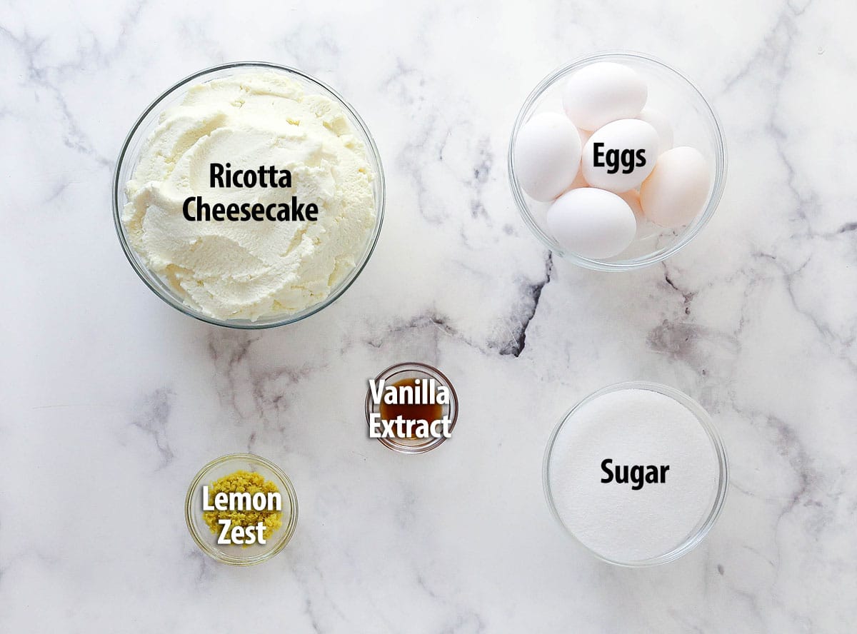 Overhead view of ingredients needed to make ricotta cheesecake
