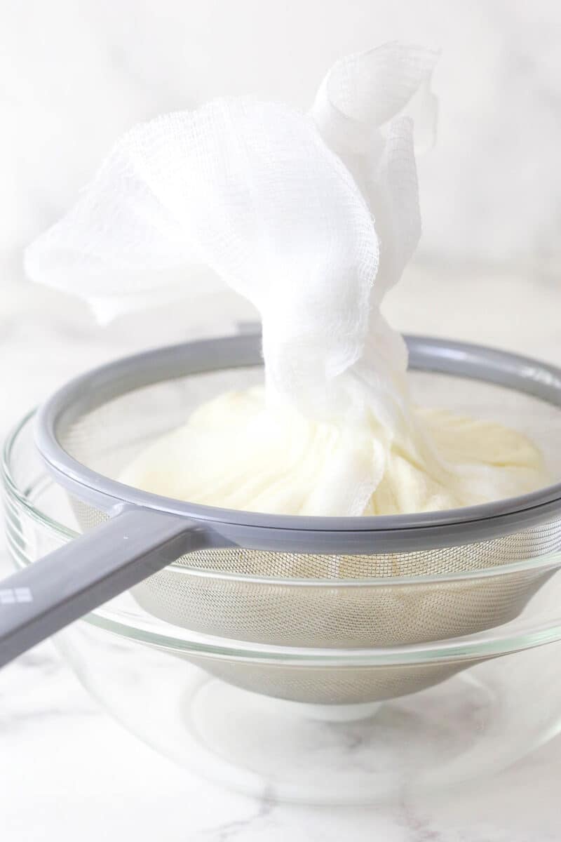 Straining ricotta cheese