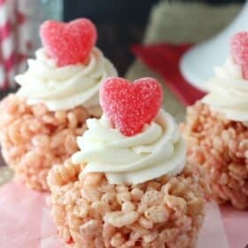 Close up of a Valentine's Day rice krispie treat on a pink napkin.