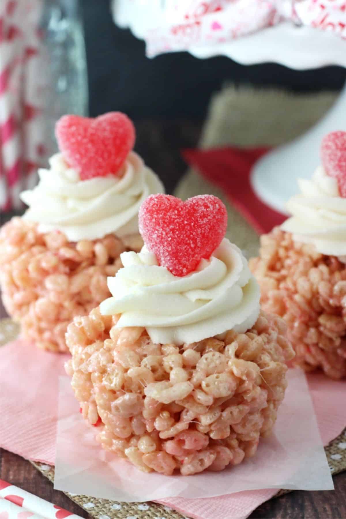 Close up of a Valentine's Day rice krispie treat on a pink napkin.