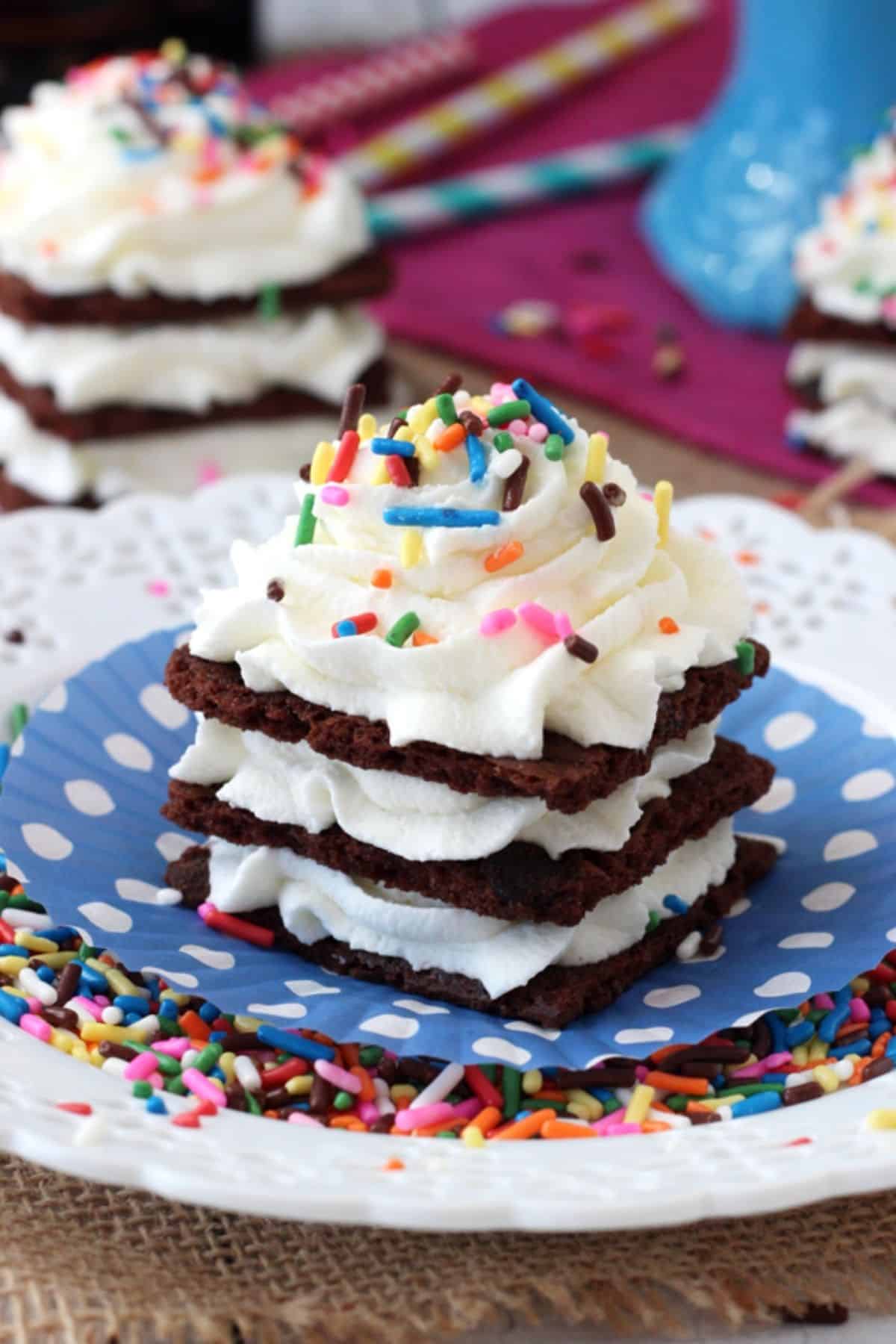 A Brownie Brittle icebox cupcake on a polka dot wrapper.