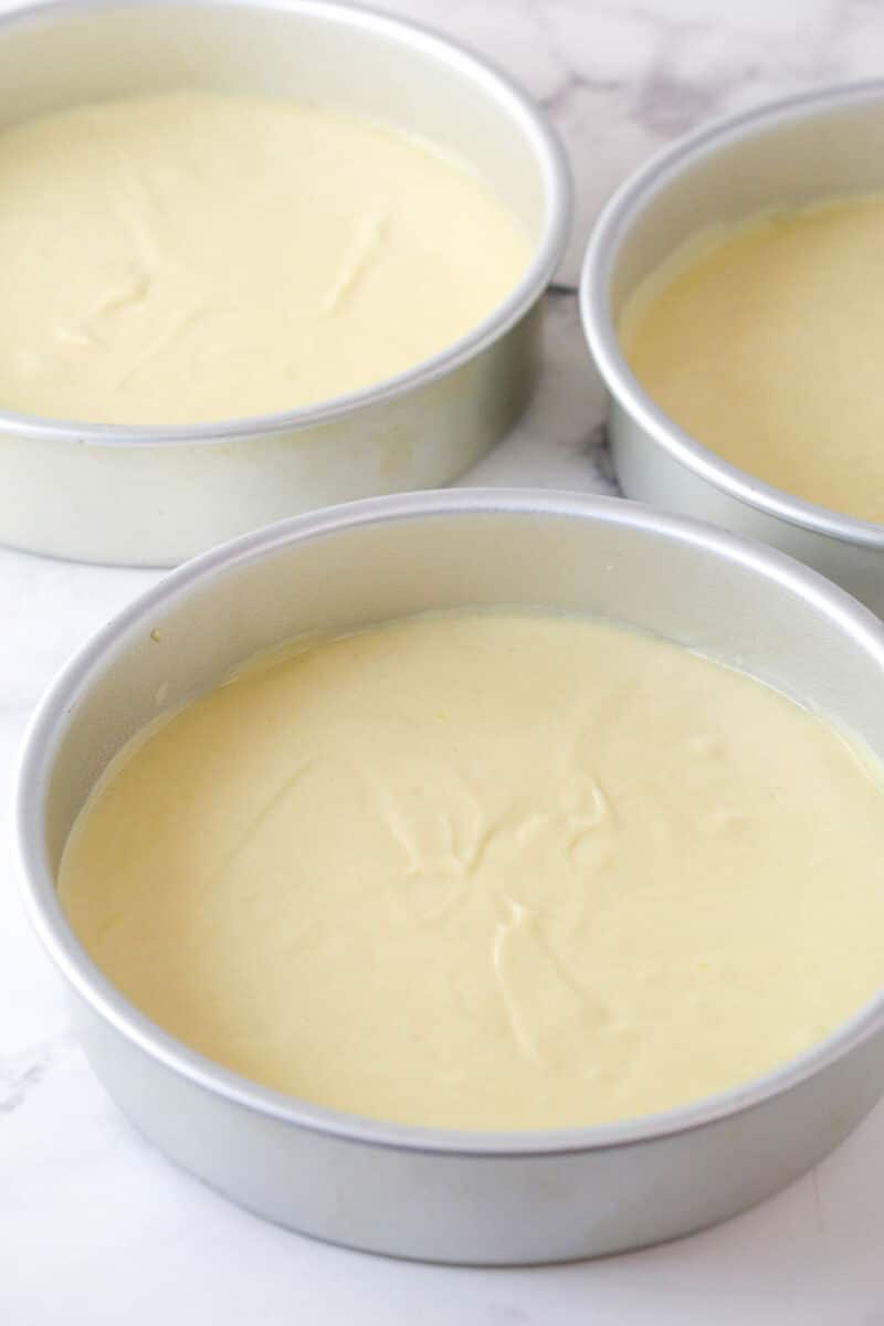 cake batter divided between 3 cake pans