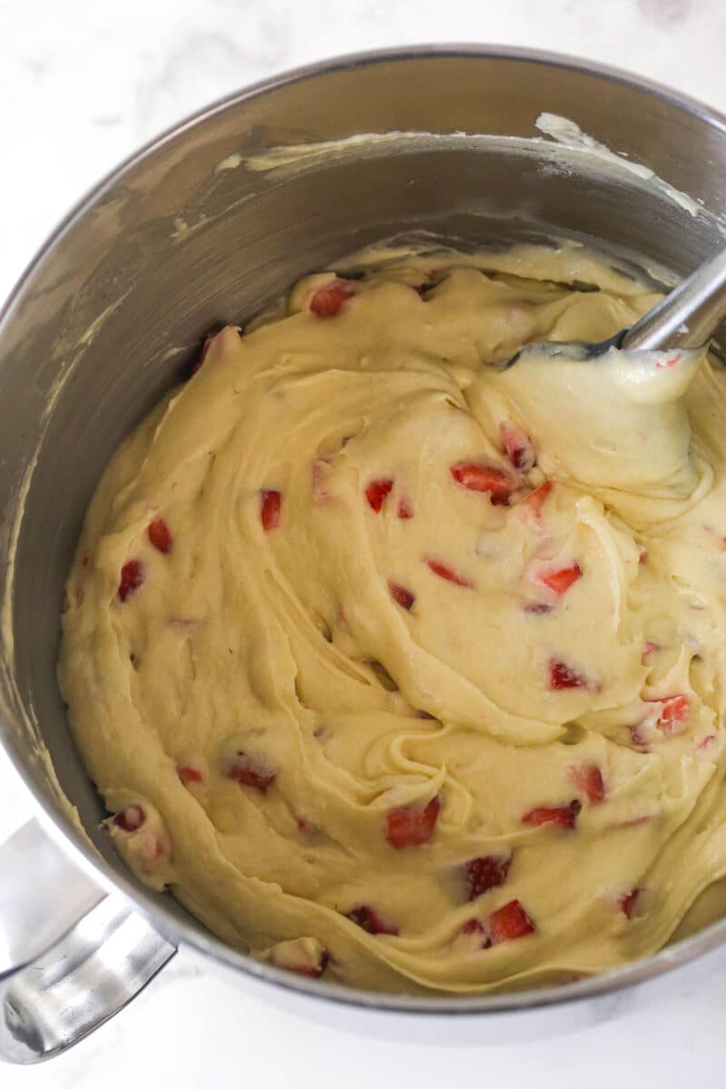 Diced strawberries folded into cake batter