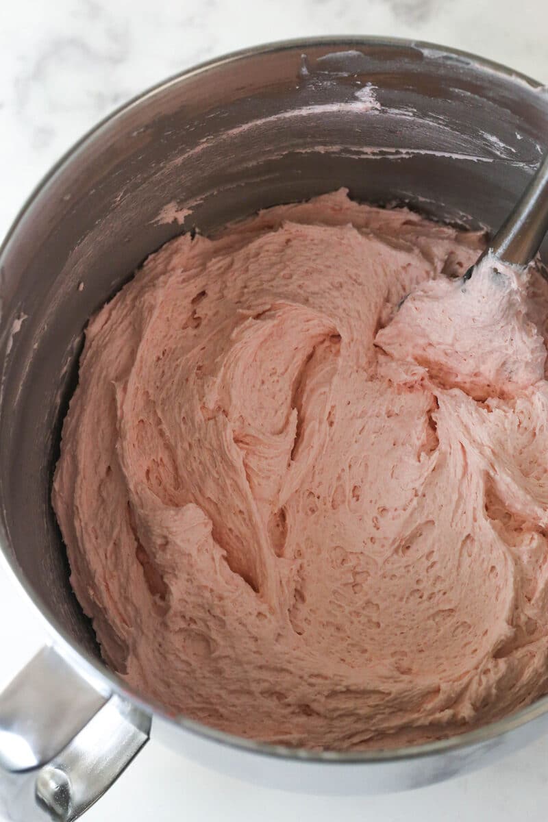 Strawberry buttercream in a mixing bowl