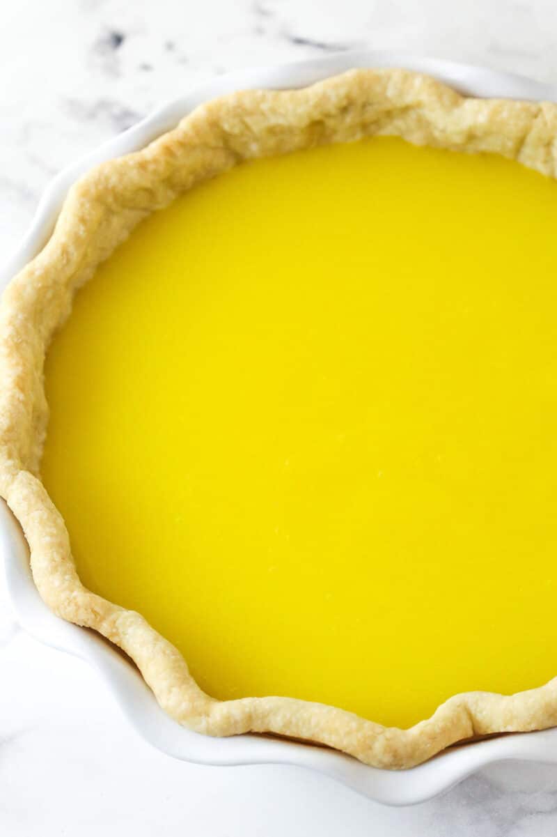 This classic lemon meringue pie features a tart lemon filling in a buttery crust topped with a light but stable meringue. Lemon filling in a pie crust