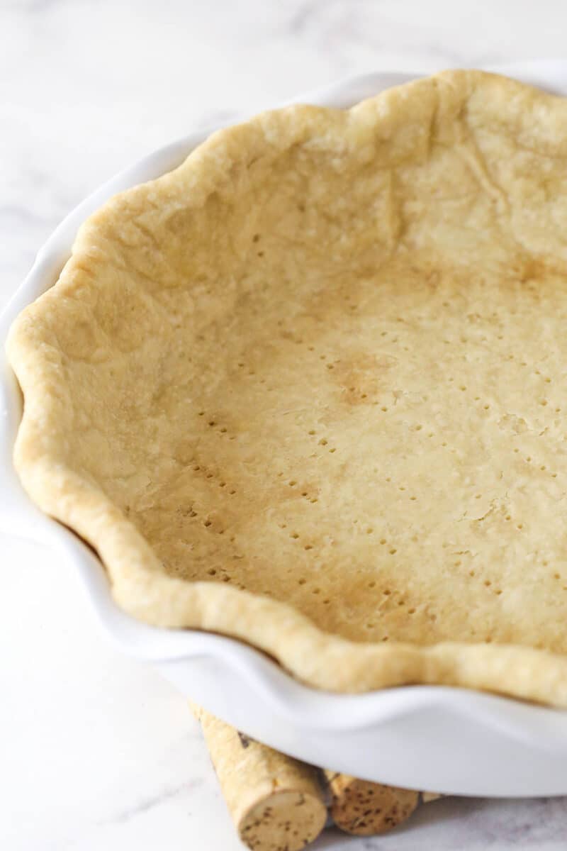 A partially baked pie crust