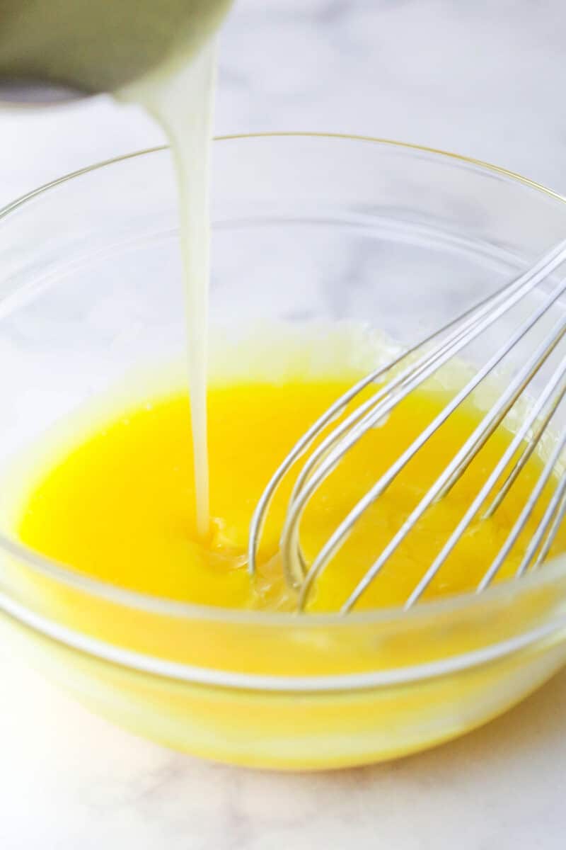 Tempering egg yolks with warm lemon filling