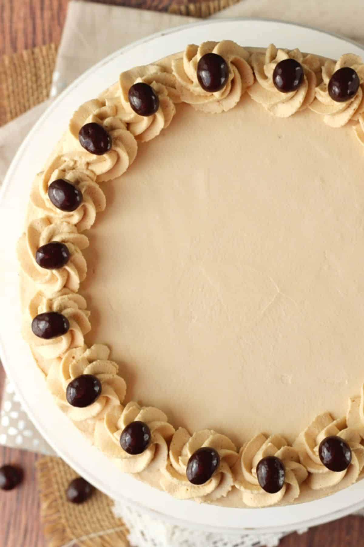 Close up of the top of a mocha brownie ice cream cake.