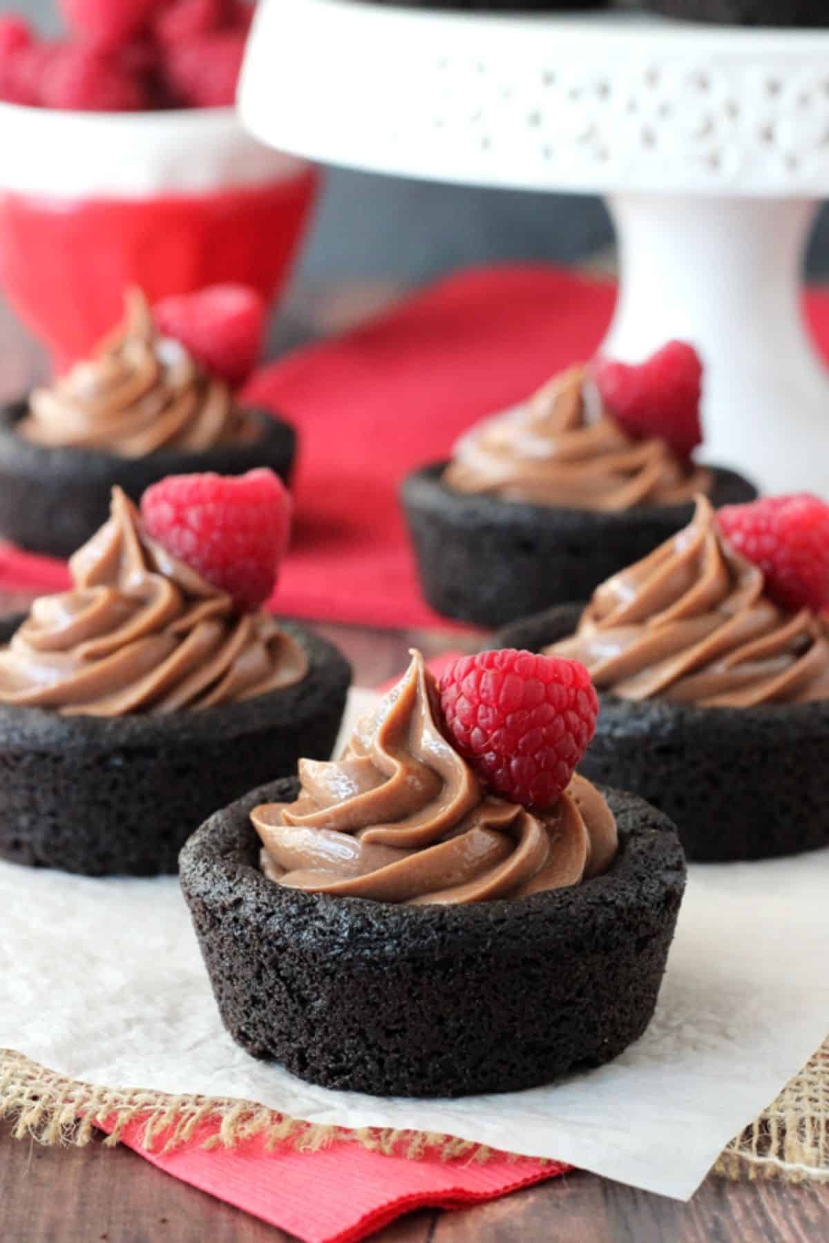 Close up of several Nutella cheesecake chocolate cookie cups.