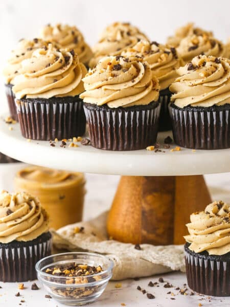 Peanut butter chocolate cupcakes on a cake stand