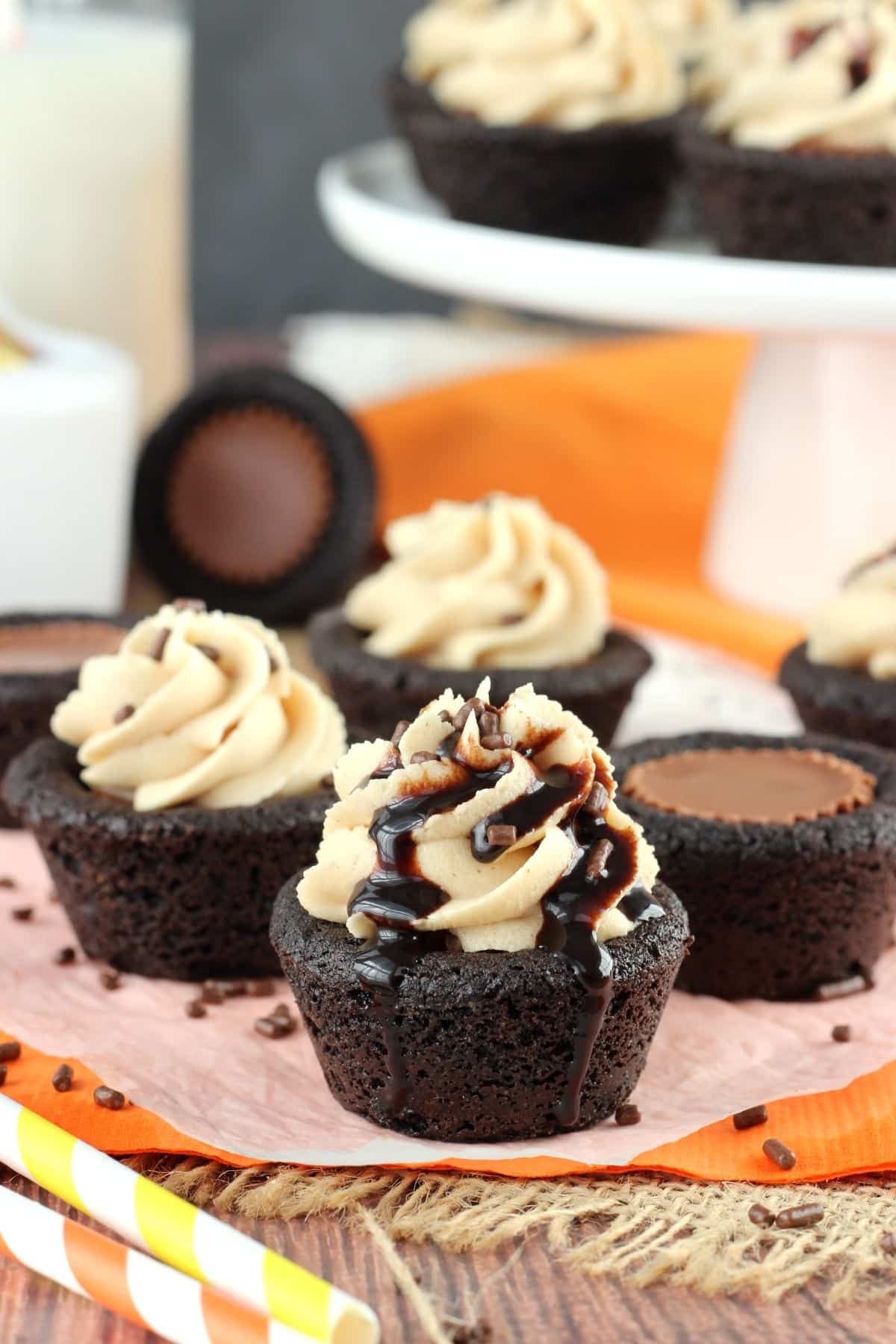 Close up of a Reese's chocolate cookie cup with a few more in the background.
