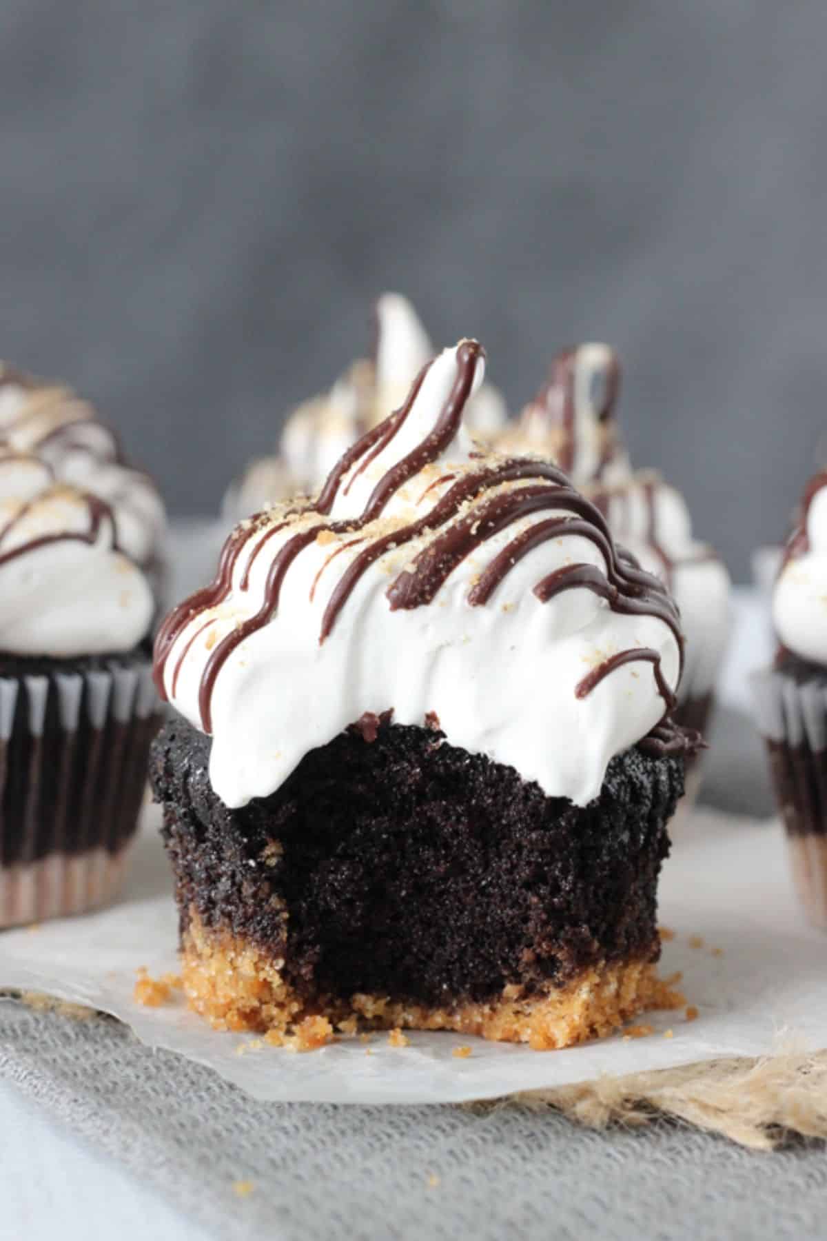 A S'mores Cupcake with a bite out of it to show center.