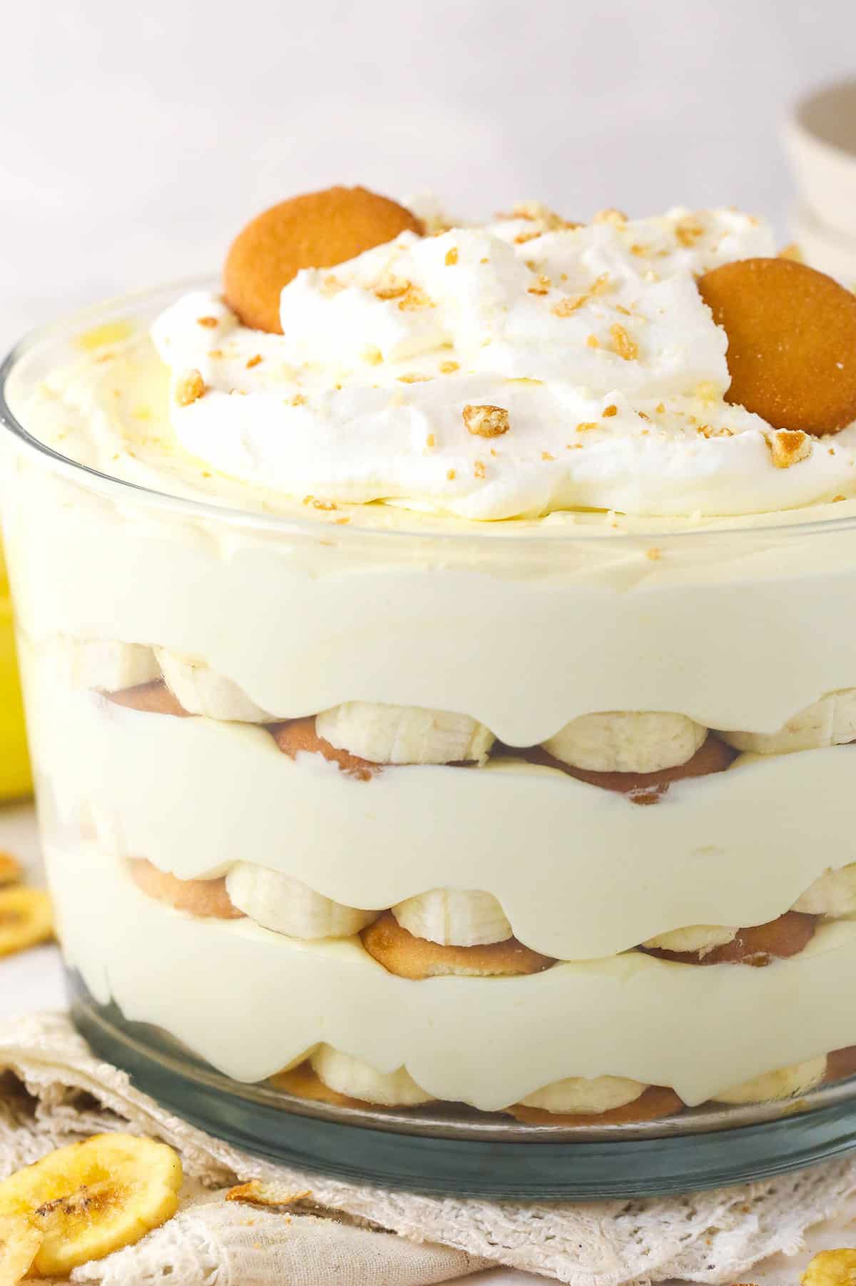 This copycat Magnolia Bakery Banana Pudding is made completely from scratch and mirrors the texture and flavors of the original. Close up of Magnolia Bakery banana pudding in a trifle bowl
