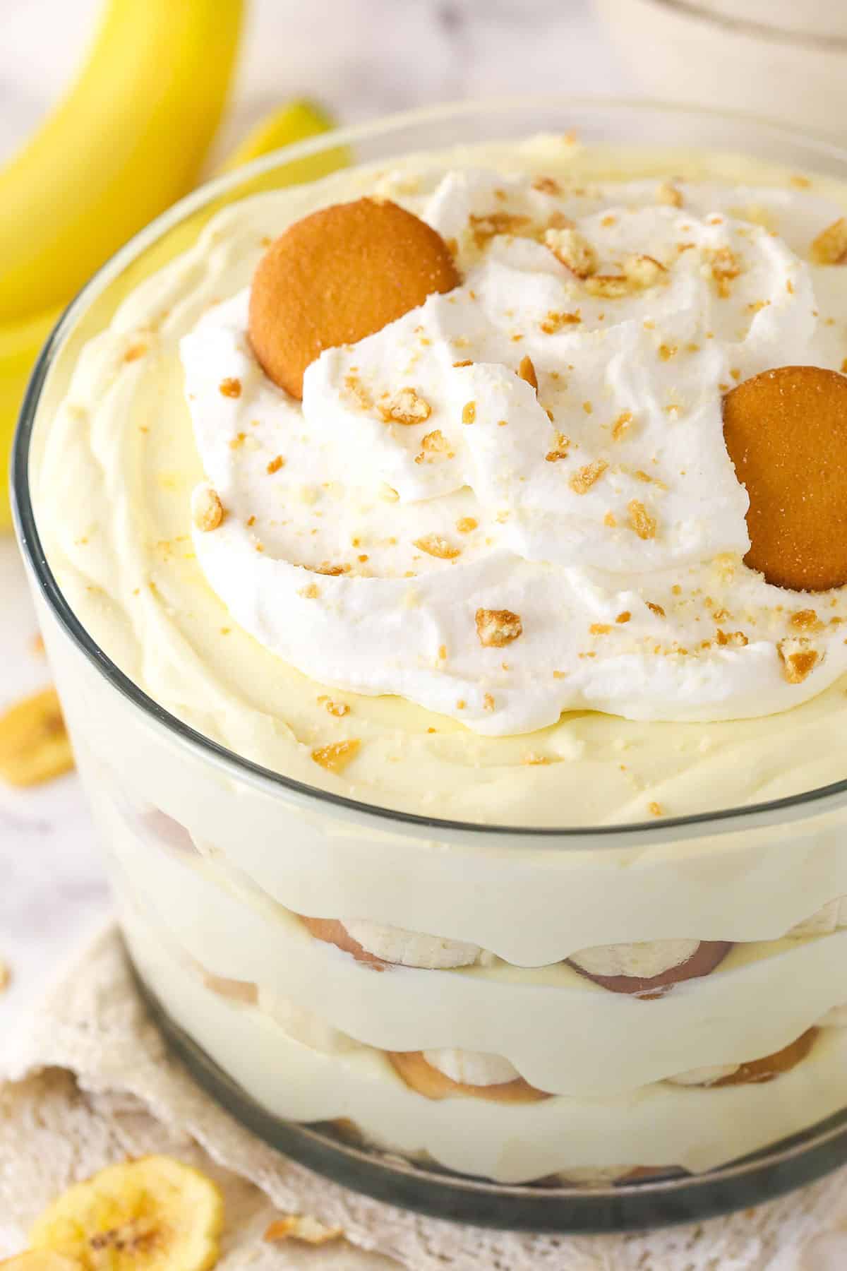 This copycat Magnolia Bakery Banana Pudding is made completely from scratch and mirrors the texture and flavors of the original. Overhead view of Magnolia Bakery banana pudding in a trifle dish