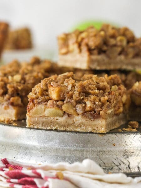 Side view of a plate of apple pie bars