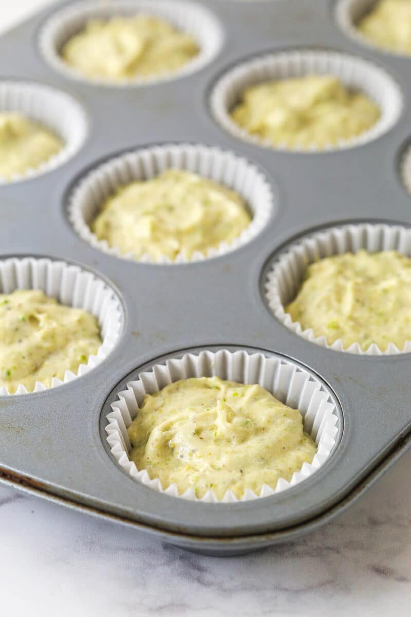 These pistachio cupcakes are full of real pistachios in the cupcakes and the buttercream, giving them their beautiful color and nutty flavor. Pistachio batter in cupcake liners