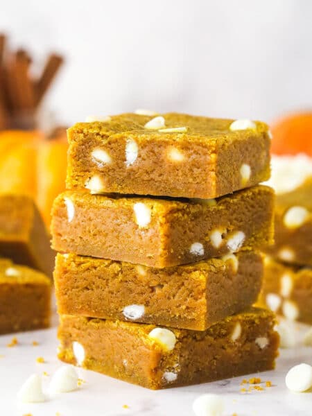 Four pumpkin blondies stacked on each other