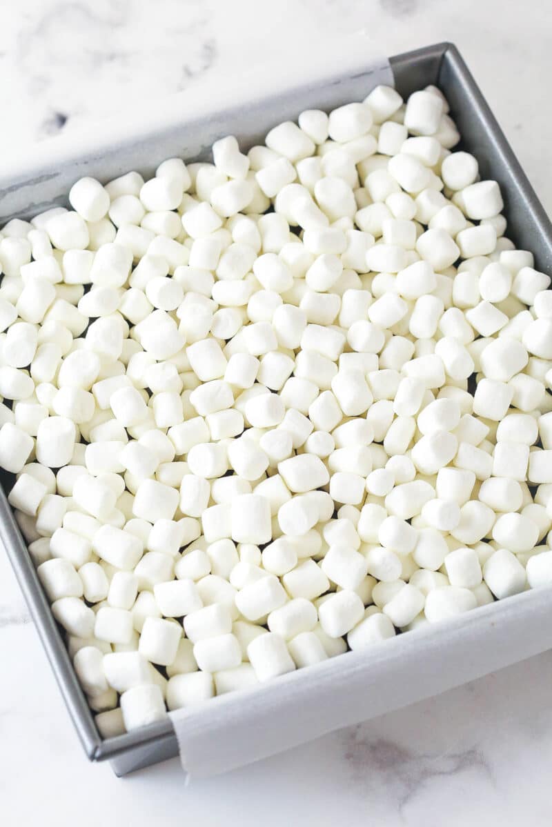 These s'mores brownies have all the classic flavors, with a graham cracker crust, fudgy brownies, ganache, and toasted marshmallows. Mini marshmallows on top of brownies