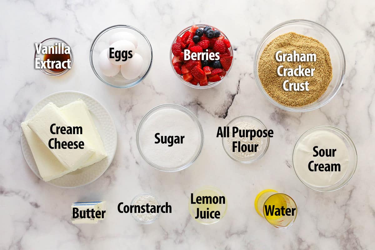 Overhead view of ingredients needed to make triple berry cheesecake