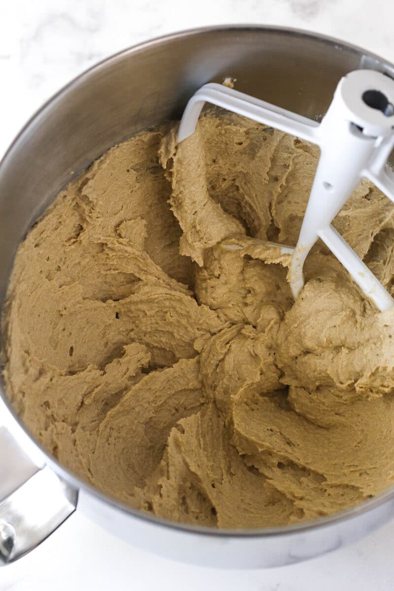 Brownie cookie dough ice cream sandwiches combine three favorites in one, with a few key ingredients to ensure they stay soft. Mixing butter, oil, and brown sugar