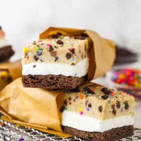Brownie cookie dough ice cream sandwiches on a plate