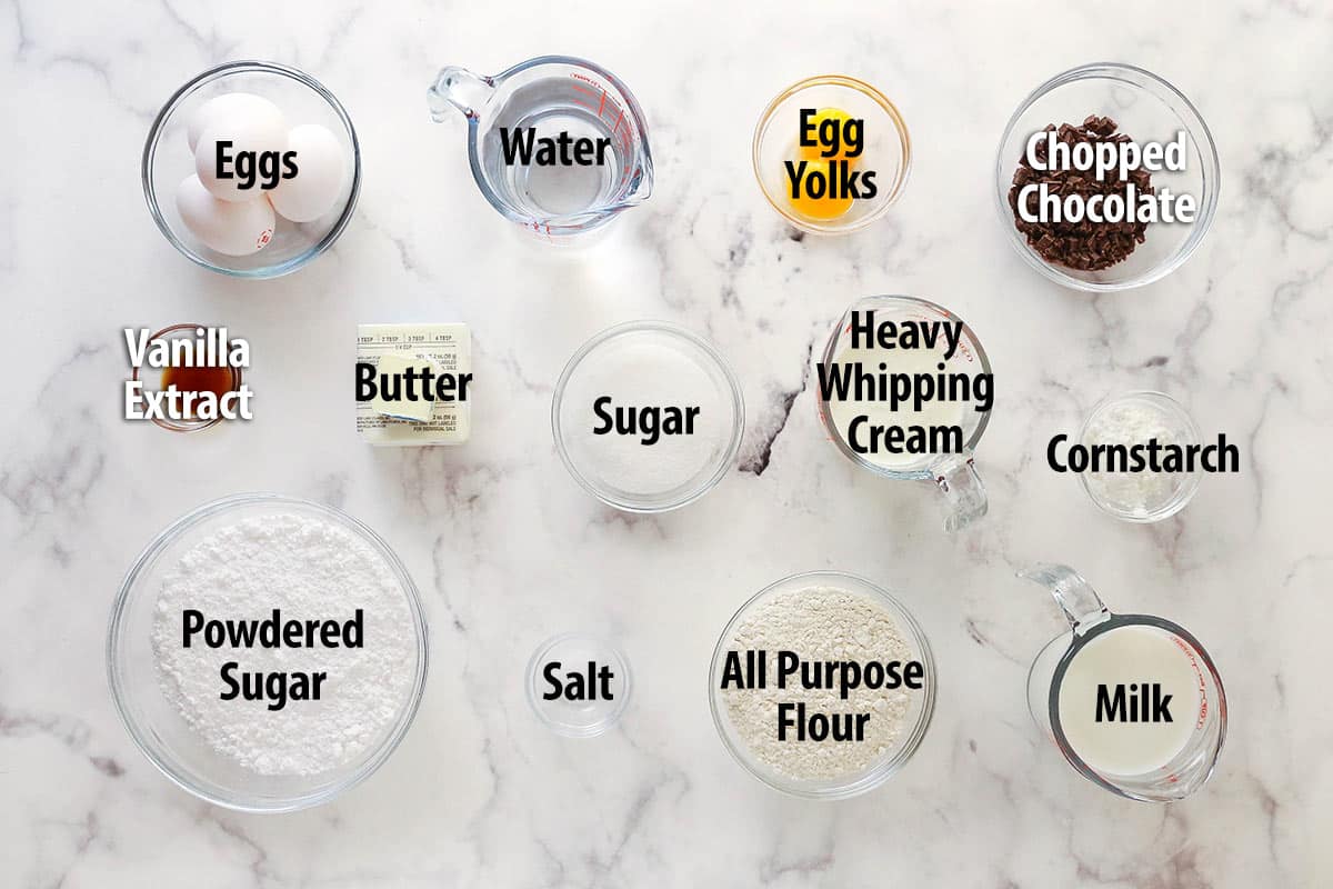 Master making cream puffs fit for a bakery and perfect for sharing with my in-depth tips and step-by-step photos. Overhead view of ingredients needed to make cream puffs