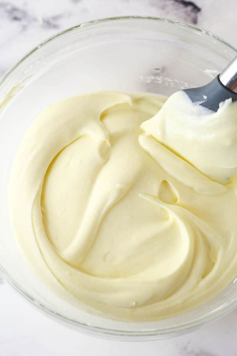 Master making cream puffs fit for a bakery and perfect for sharing with my in-depth tips and step-by-step photos. Folding whipped cream into pastry cream