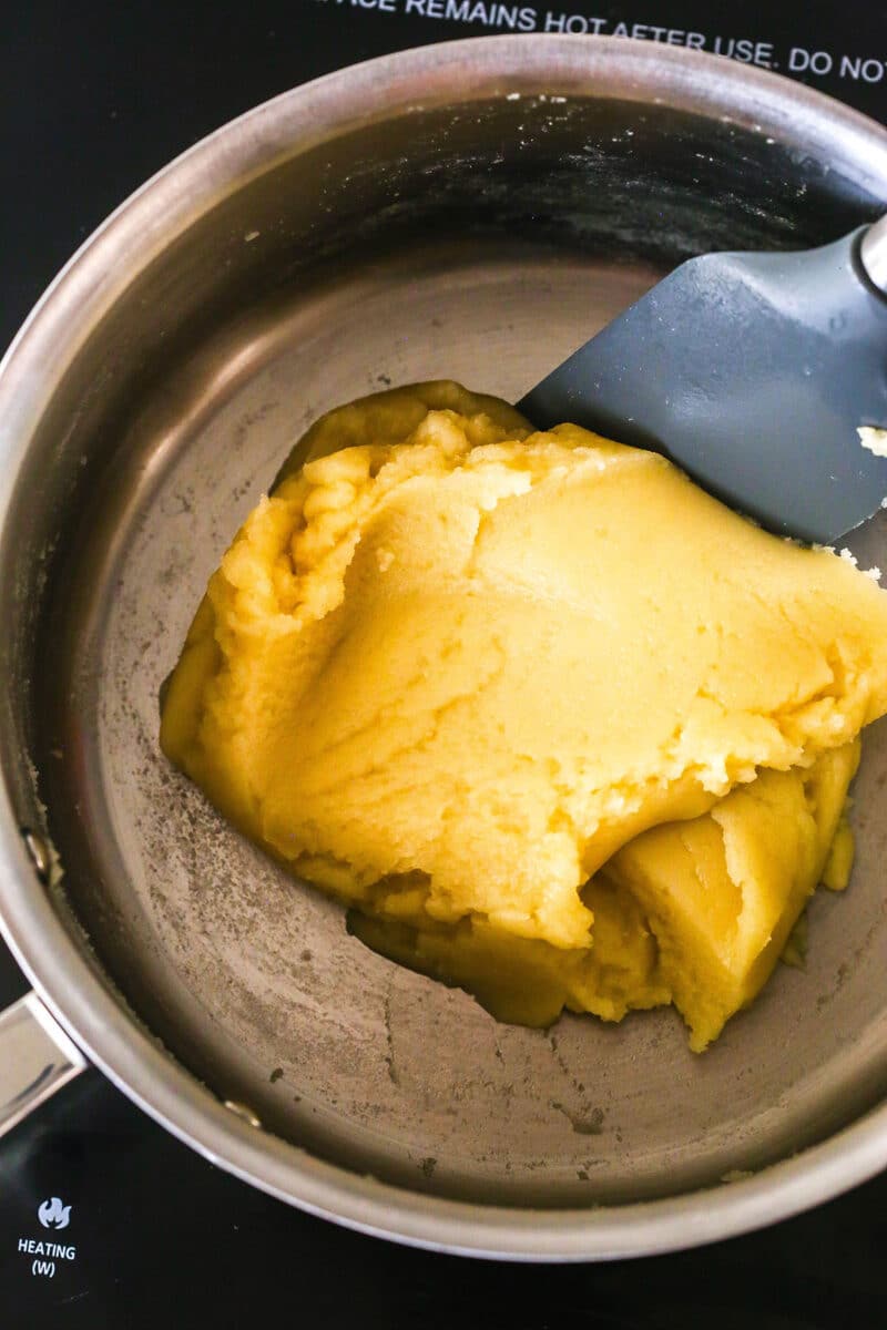 Turn 6 ingredients into the perfect choux pastry base for eclairs, cream puffs, and more with these expert tips. Forming the cooked flour into a ball