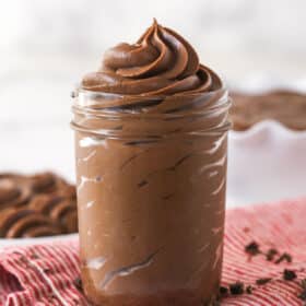 A glass jar of chocolate pastry cream
